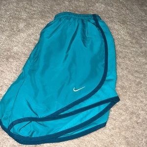 Blue Nike shorts
